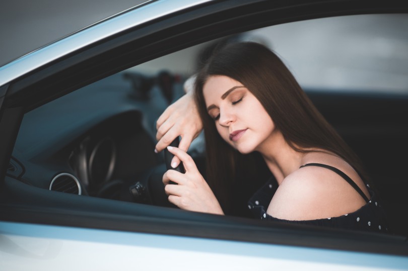 tired-woman-sleeping-on-wheel-