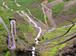 Eskil riding a bike backwards at Trollstigen