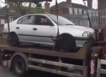 Idiot Tries to Drive His Car off Tow Truck