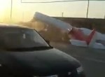 aeroplane crashes on a car
