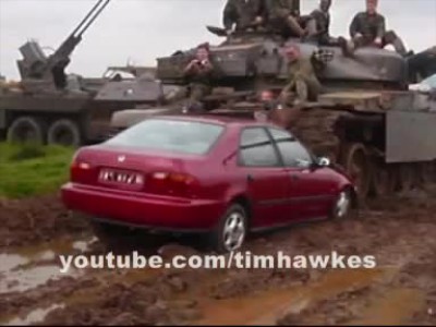 Honda-Civic-parked-on-by-a-tank